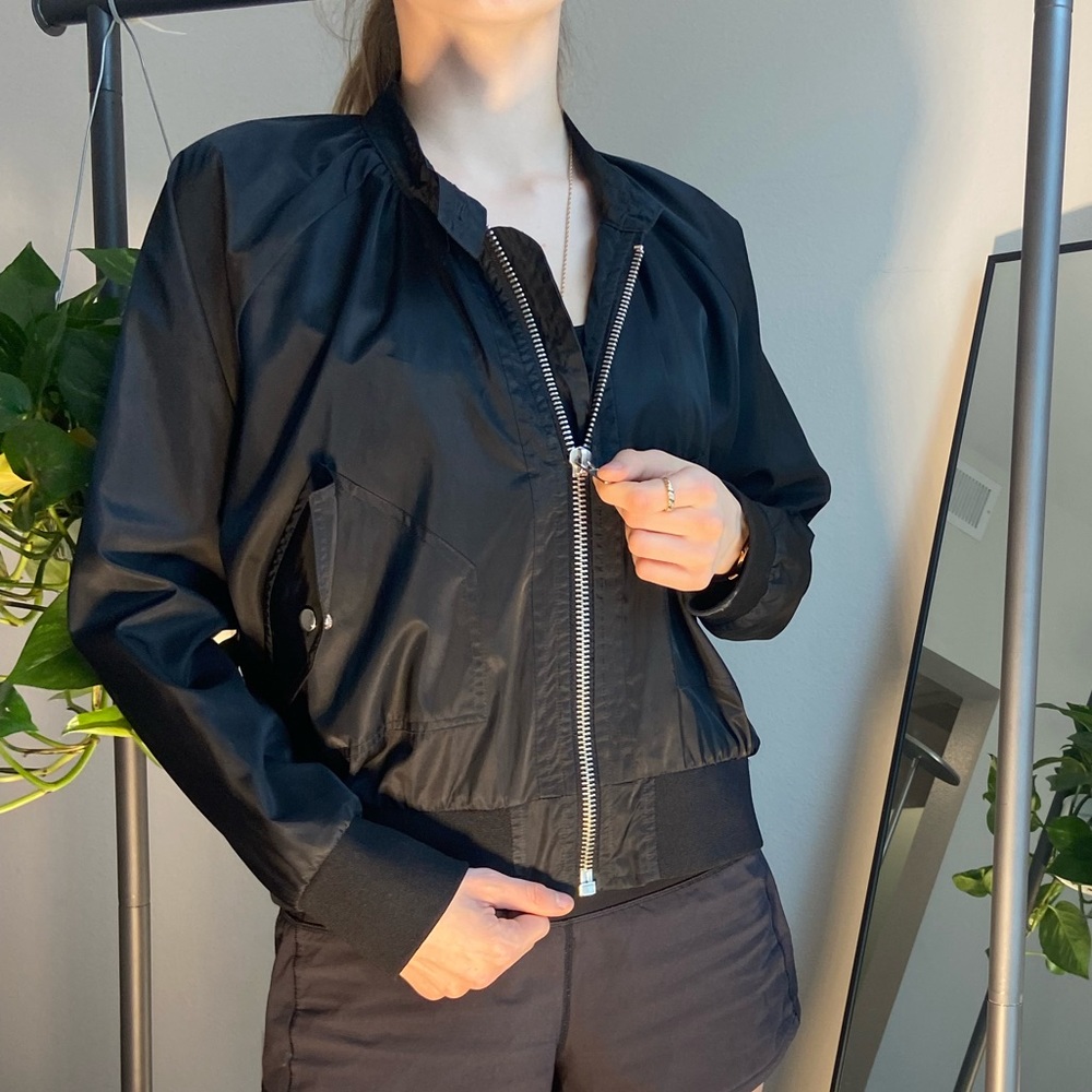 Black bomber jacket with heavy duty high quality silver zipper.